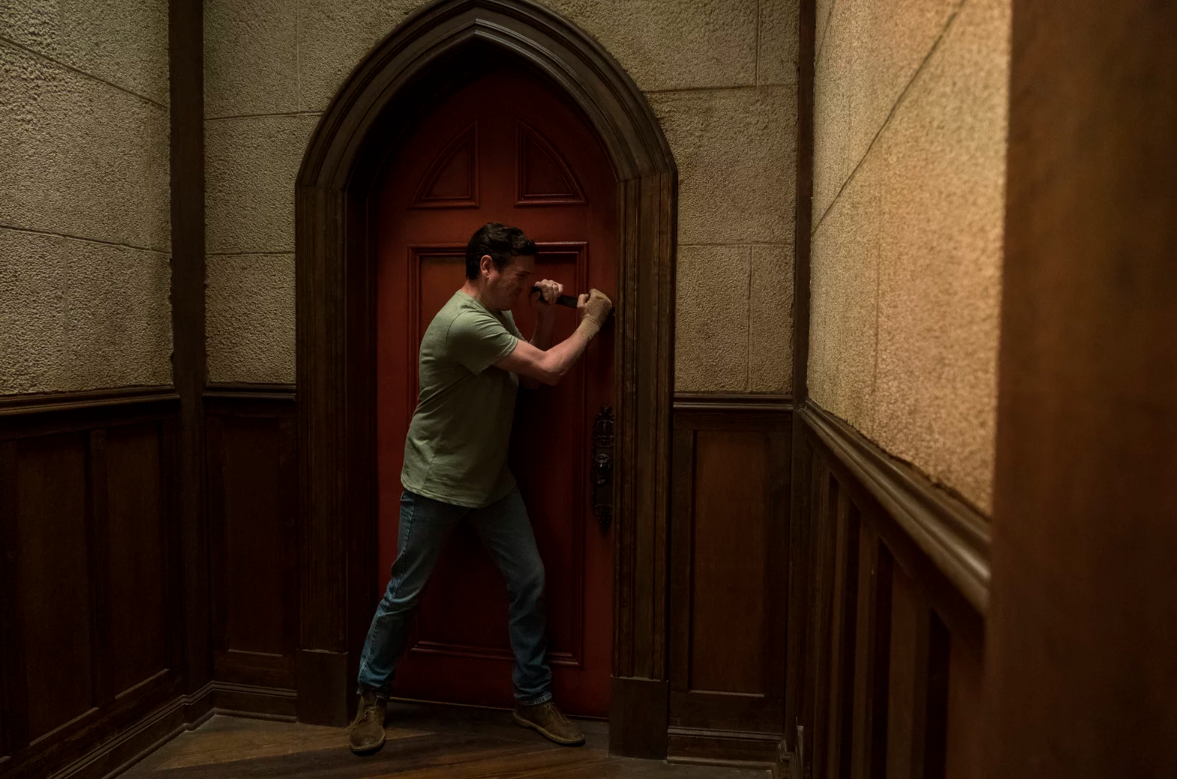 A screenshot of the red door from Netflix's Haunting of Hill House